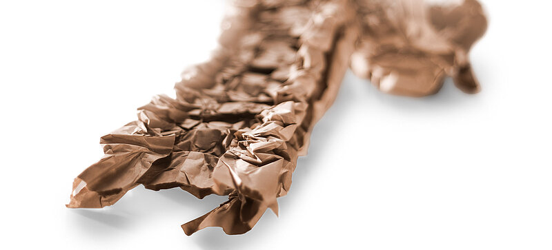 A brown paper cushioning strip