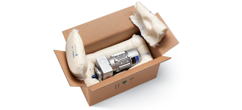 A cardboard box containing an engine component and foam packaging