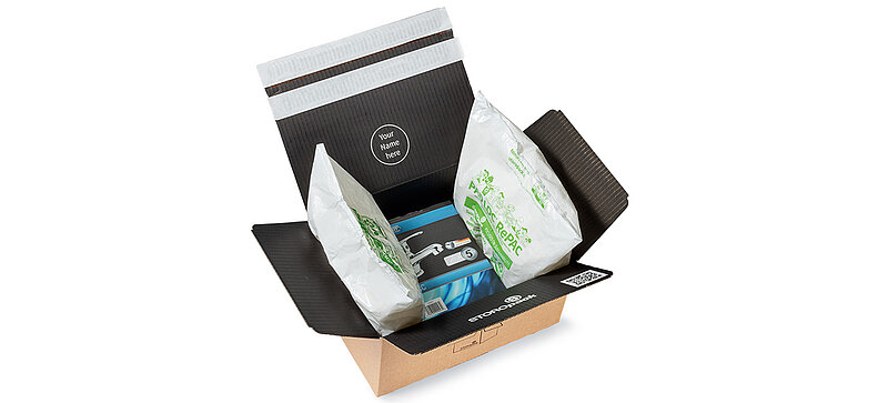 A box with plastic bags with packing chips